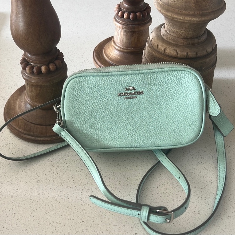 Very cute Coach clutch with crossbody strap